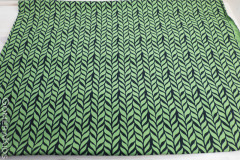 Puuvillane_trikotaaž_Rohelise_mustaga_palmikud