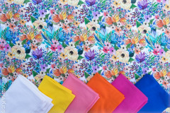 Puuvillane_trikotaaz_joonistatud_kollased_lillad_lilled